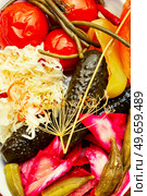 Set salted vegetable pickles, spicy pickled on a plate. Canned food. Tasty homemade pickles vegetables. Стоковое фото, агентство Ingram Publishing / Фотобанк Лори