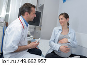pregnant woman with doctor at hospital. Стоковое фото, агентство Ingram Publishing / Фотобанк Лори