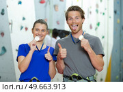 climbers showing off their medals. Стоковое фото, агентство Ingram Publishing / Фотобанк Лори