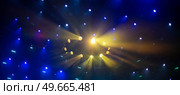 rays of light illuminate the scene at the concert. Стоковое фото, агентство Ingram Publishing / Фотобанк Лори