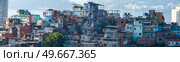 Favelas in the city of Rio de Janeiro. A place where poor people live. Brazil. Стоковое фото, агентство Ingram Publishing / Фотобанк Лори