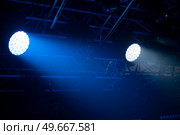 rays of light illuminate the scene at the concert. Стоковое фото, агентство Ingram Publishing / Фотобанк Лори