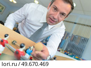 playing table football. Стоковое фото, агентство Ingram Publishing / Фотобанк Лори