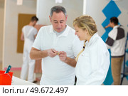 portrait of painter with female apprentice. Стоковое фото, агентство Ingram Publishing / Фотобанк Лори