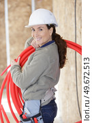 woman working with colorful tubes. Стоковое фото, агентство Ingram Publishing / Фотобанк Лори