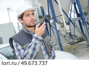 portrait of a man reporting to the supervisor. Стоковое фото, агентство Ingram Publishing / Фотобанк Лори