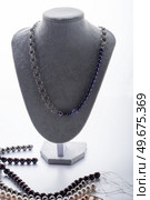 author jewelry demonstrated  against  white background. fashion and jewelry concept. Стоковое фото, агентство Ingram Publishing / Фотобанк Лори