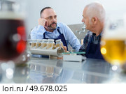 portrait of worker in seed factory. Стоковое фото, агентство Ingram Publishing / Фотобанк Лори