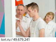 young house painters and decorators apprentices. Стоковое фото, агентство Ingram Publishing / Фотобанк Лори