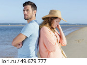 couple after having had an argument on the sea. Стоковое фото, агентство Ingram Publishing / Фотобанк Лори