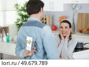 surprised happy woman is about to receive a birthday gift. Стоковое фото, агентство Ingram Publishing / Фотобанк Лори