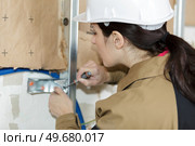 construction inspector examine styrofoam insulation of house. Стоковое фото, агентство Ingram Publishing / Фотобанк Лори