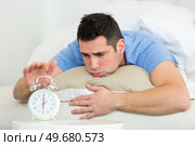 sad man does not want to wake up. Стоковое фото, агентство Ingram Publishing / Фотобанк Лори