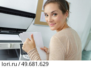 a woman doing copies with thumb up. Стоковое фото, агентство Ingram Publishing / Фотобанк Лори
