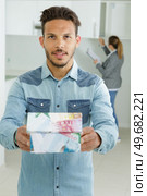a man and housing purchase plan. Стоковое фото, агентство Ingram Publishing / Фотобанк Лори