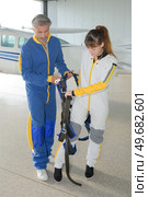 they are putting on the equipment. Стоковое фото, агентство Ingram Publishing / Фотобанк Лори