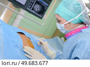 portrait of nurse removing a tumor. Стоковое фото, агентство Ingram Publishing / Фотобанк Лори