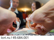 close up of playing cards and shuffling. Стоковое фото, агентство Ingram Publishing / Фотобанк Лори