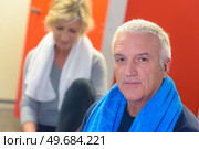 middle age people in the locker gym. Стоковое фото, агентство Ingram Publishing / Фотобанк Лори