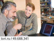 portrait of happy trainee at work. Стоковое фото, агентство Ingram Publishing / Фотобанк Лори