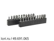 Screwdriver bit set close-up, white background. Стоковое фото, фотограф Корнеев Вячеслав / Фотобанк Лори