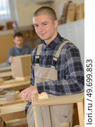 portrait of young carpentry apprentice. Стоковое фото, агентство Ingram Publishing / Фотобанк Лори