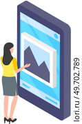 Woman browsing photo gallery, picture on mobile phone display. Smartphone screen with photo and video storage app icon. Virtual storage application for images. Posting photos to social network concept. Woman browsing photo gallery, picture on display. Smartphone screen with photo and video storage. Стоковая иллюстрация, агентство Ingram Publishing / Фотобанк Лори
