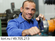 happy man around the milling machine at factory. Стоковое фото, агентство Ingram Publishing / Фотобанк Лори