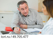 customer in showroom choosing color or material for furnishing. Стоковое фото, агентство Ingram Publishing / Фотобанк Лори
