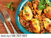 Tasty stuffed squid with salsa sauce and with minced pork.. Grilled stuffed squid in salsa sauce. Стоковое фото, агентство Ingram Publishing / Фотобанк Лори