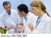 young attractive female scientist researching in the laboratory. Стоковое фото, агентство Ingram Publishing / Фотобанк Лори