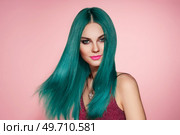 Beauty fashion model girl with colorful dyed hair. Girl with perfect makeup and hairstyle. Model with perfect healthy smooth hair. Стоковое фото, агентство Ingram Publishing / Фотобанк Лори