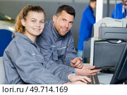 portrait of two workersin factory. Стоковое фото, агентство Ingram Publishing / Фотобанк Лори