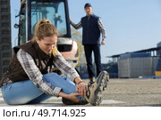 woman having a sprain at work. Стоковое фото, агентство Ingram Publishing / Фотобанк Лори