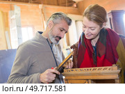 male woodworker fixing old furniture. Стоковое фото, агентство Ingram Publishing / Фотобанк Лори
