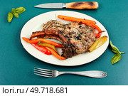 Fried ribeye or tomahawk pork meat steak. Top view. Roasted pork tomahawk steak, BBQ. Стоковое фото, агентство Ingram Publishing / Фотобанк Лори