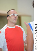 two pala players in discussion. Стоковое фото, агентство Ingram Publishing / Фотобанк Лори