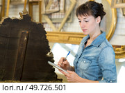 female wooden antique restoration worker. Стоковое фото, агентство Ingram Publishing / Фотобанк Лори