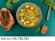Nettle soup made from young of nettles. Healthy vegan nettle soup. Стоковое фото, агентство Ingram Publishing / Фотобанк Лори