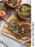 special muesli and granules for sportive horses  served in bowls around muesli background.   feeding and horse care concept. Стоковое фото, агентство Ingram Publishing / Фотобанк Лори