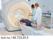 patient undergoing mri scan at hospital. Стоковое фото, агентство Ingram Publishing / Фотобанк Лори
