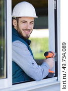 handyman using a cordless screwdriver. Стоковое фото, агентство Ingram Publishing / Фотобанк Лори