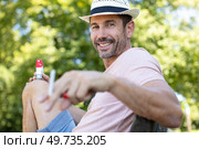 bearded man smokes a cigarette. Стоковое фото, агентство Ingram Publishing / Фотобанк Лори