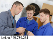 a tyre engineer in workshop. Стоковое фото, агентство Ingram Publishing / Фотобанк Лори