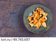 Dry pineapples or ananas in bowls. Candy pineapples, candied fruits.. Slices of dehydrated pineapple. Стоковое фото, агентство Ingram Publishing / Фотобанк Лори