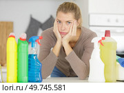 portrait of an exhausted young housemaid. Стоковое фото, агентство Ingram Publishing / Фотобанк Лори