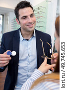 happy man and contact lenses with glasses. Стоковое фото, агентство Ingram Publishing / Фотобанк Лори