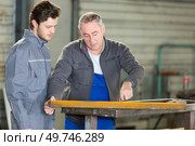 portrait of carpenter and apprentice. Стоковое фото, агентство Ingram Publishing / Фотобанк Лори