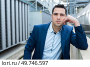 portrait of suited man on industrial site. Стоковое фото, агентство Ingram Publishing / Фотобанк Лори