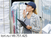 a laundry manager at work. Стоковое фото, агентство Ingram Publishing / Фотобанк Лори